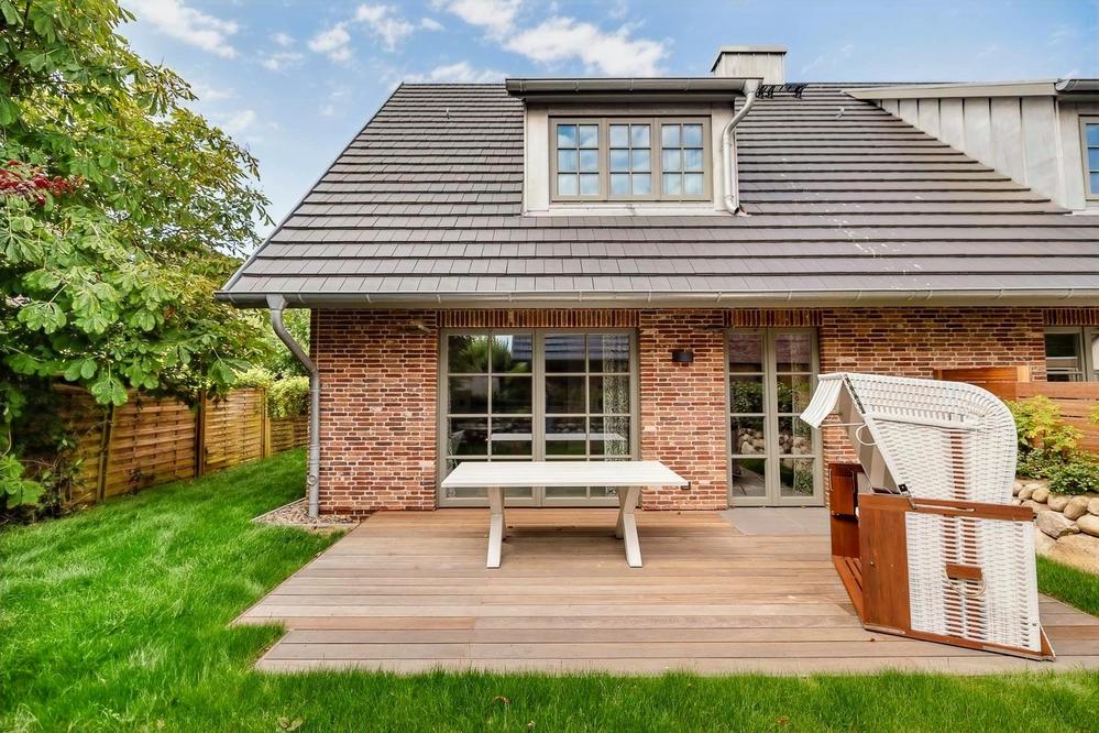 Bild Neubau Haus Lerchenweg Sylt: Bild eines hellen Wohnzimmers