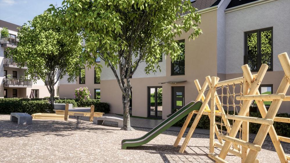 Bild Neubau Eigentumswohnungen Gaugasse Wiesbaden: Bild eines Mehrfamilienhauses mit Spielplatz