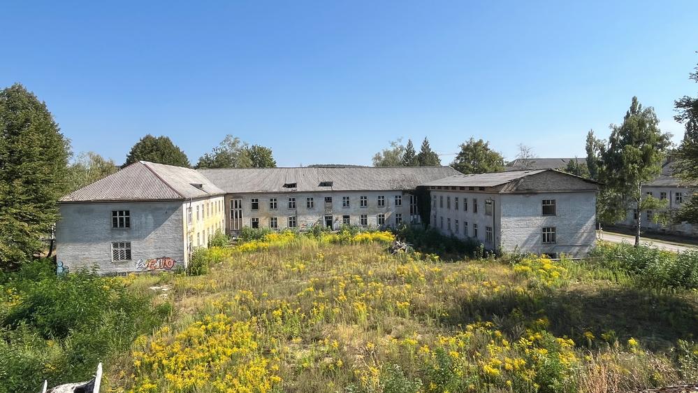 Bild Neubau Eigentumswohnungen URBAN AURA, Potsdam: Visualisierung eines modernen Wohnzimmers