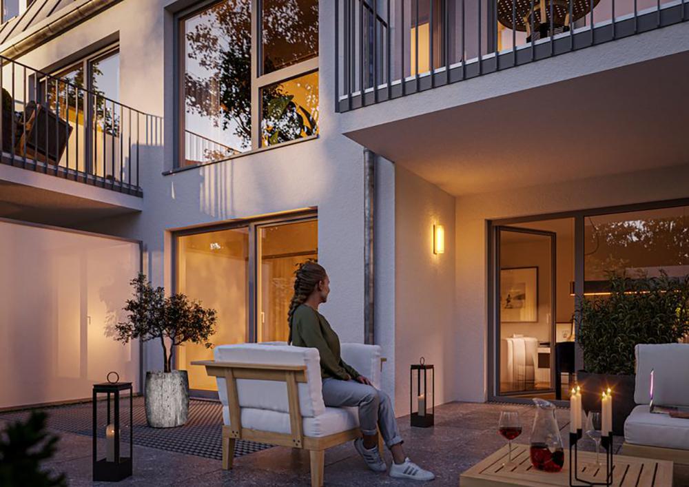 Bild Neubau Eigentumswohnungen Fliederstraße Vaterstetten: Visualisierung einer Terrasse mit Menschen