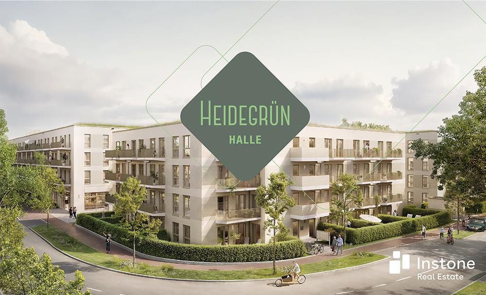 Bild Neubau Eigentumswohnungen Bertha-von-Suttner-Platz Halle Saale: Bild Dachaufsicht eines Mehrfamilienhaus mit Projektlogo