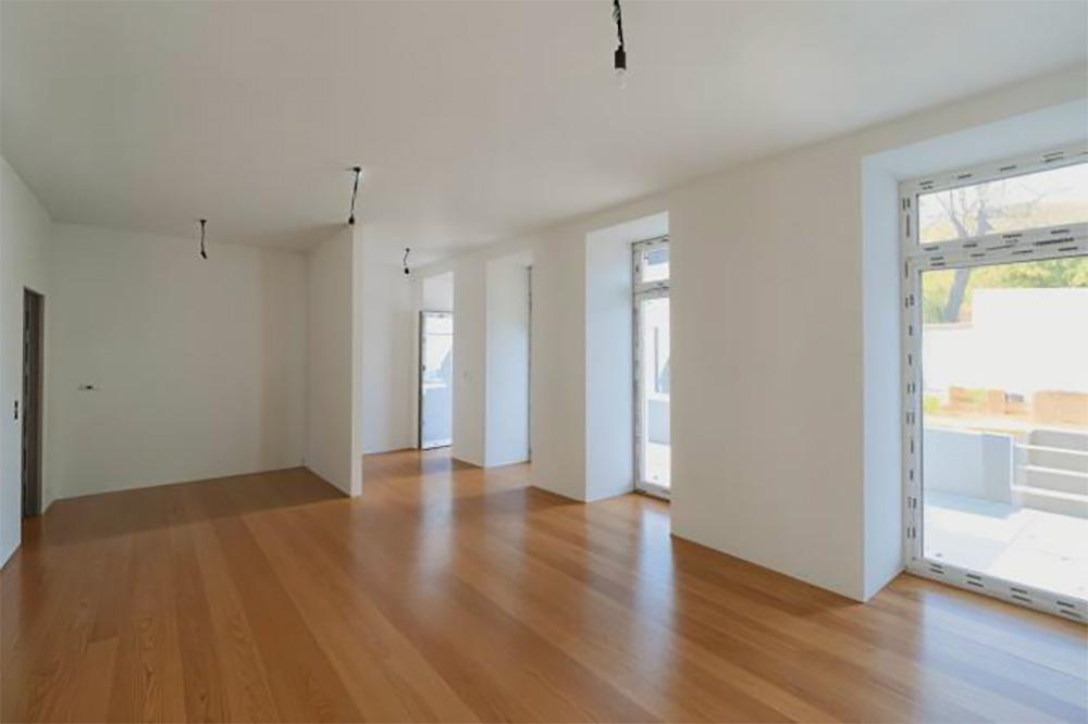 Bild Kernsanierung Eigentumswohnungen Abt-Karl-Gasse und Schulgasse Wien: Bild eines hellen Zimmers