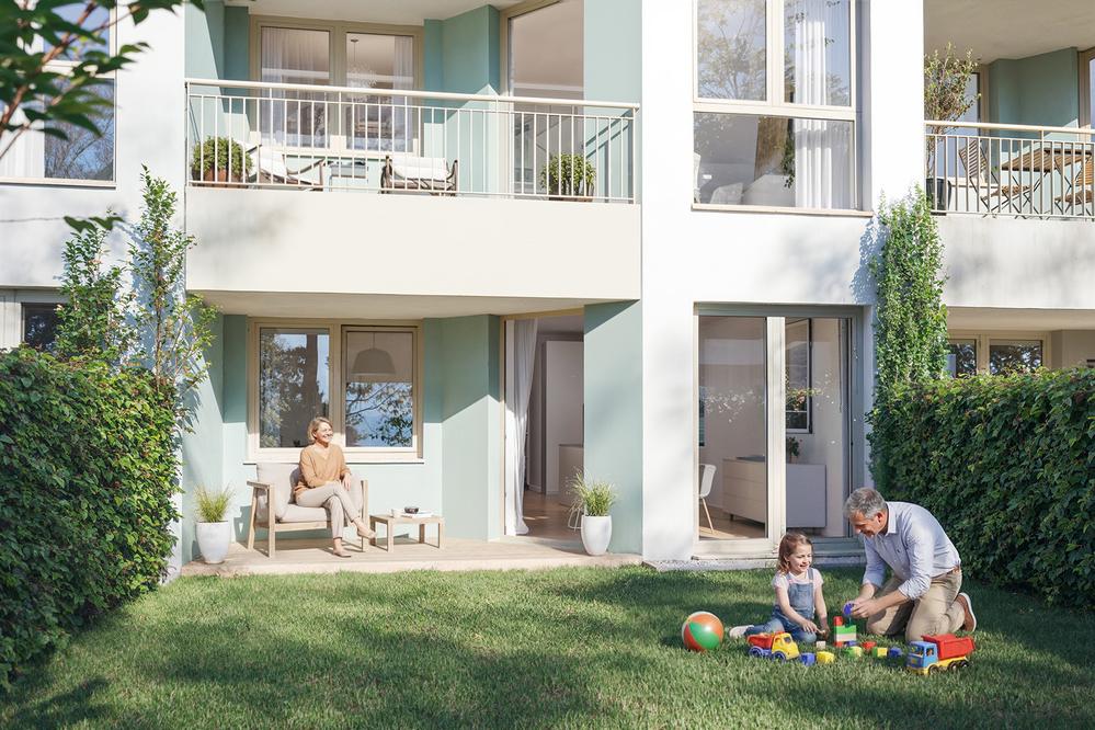 Bild Neubau Eigentumswohnungen Gaulskopfstraße Ober-Mörlen: Visualisierung einer Gartenterrasse mit Menschen