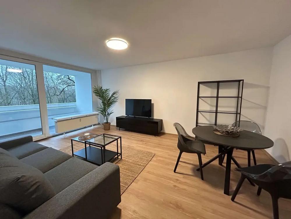 Bild Neubau Eigentumswohnungen Angerburger Allee, Berlin: Visualisierung dunkles Wohnzimmer