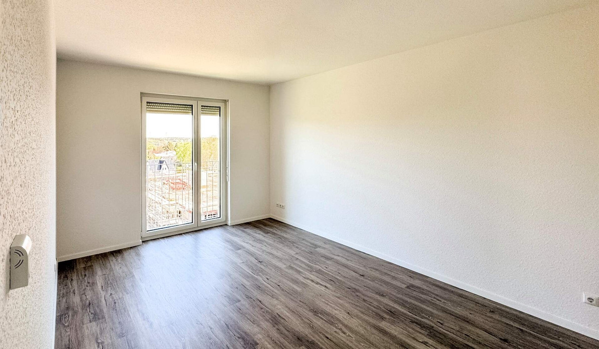 Das Schlafzimmer als ruhiger Rückzugsort mit eigenem Bad für die ersten Minuten des Tages