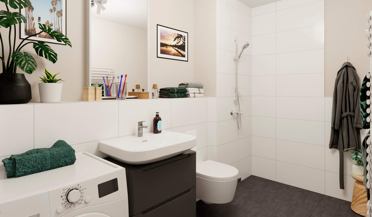 Das Badezimmer enthält eine bodengleiche Dusche