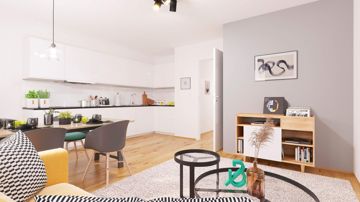 Wohnzimmer mit Essecke und Blick auf die Küche