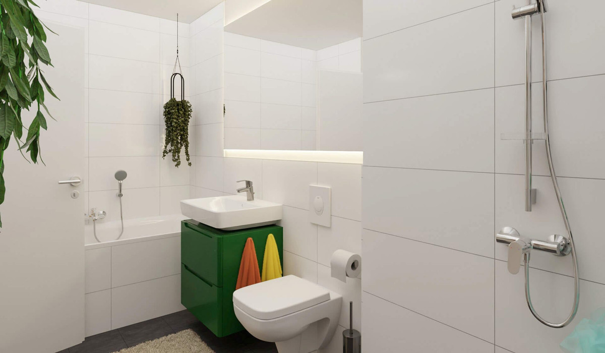 Das Badezimmer enthält eine bodengleiche Dusche